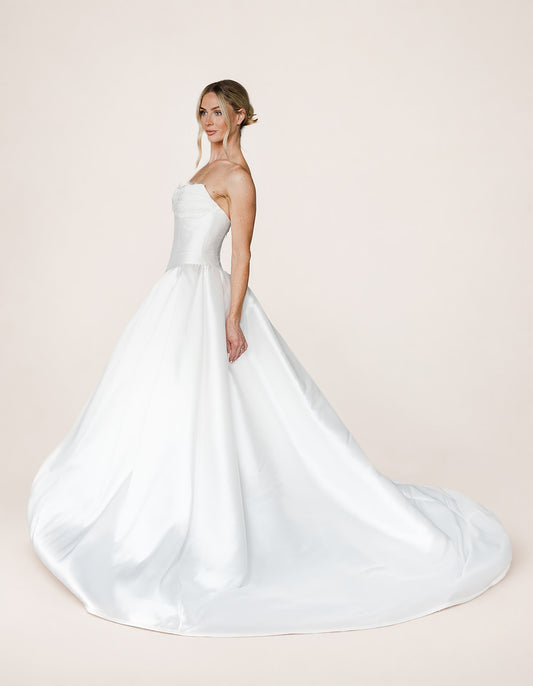 Ava by Aura by Archela - Strapless satin ball gown with lace appliqued neckline, fitted bodice, full skirt and long train