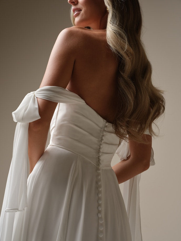 Melody with slit and sleeves
